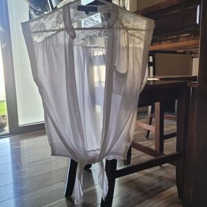 White cotton button/belly tie short sleeve top with lace on back along shoulders
